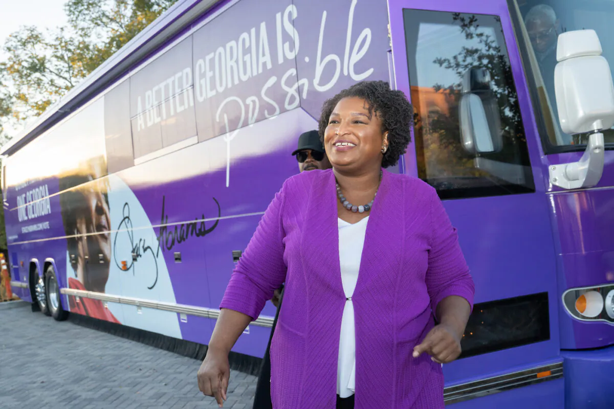 Georgia Democratic gubernatorial candidate Stacey Abrams rallied supporters at The Eastern theater in Atlanta on November, 5, 2022. Here she arrives for a campaign event as early voting begins in Jonesboro, Ga. on Oct. 18, 2022. (Megan Varner/Getty Images)