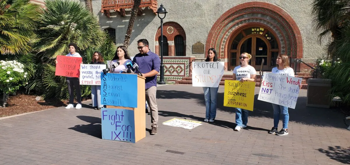 Members of Students Against Sexual Assault hold a rally in front of the university’s Tower Hall in San Jose, Calif., on Oct. 12, 2022. (David Lam/NTD)