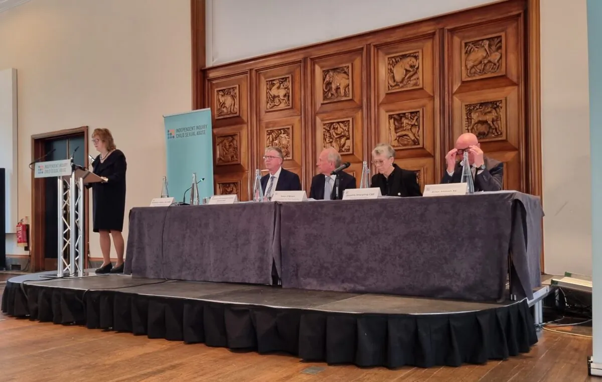 Professor Alexis Jay, chair of the Independent Inquiry into Child Sexual Abuse, delivers her speech, watched by (L to R) Professor Malcolm Evans, John O'Brien, Drusilla Sharpling and Brian Altman, KC, in London on Oct. 20, 2022 (Chris Summers/The Epoch Times)
