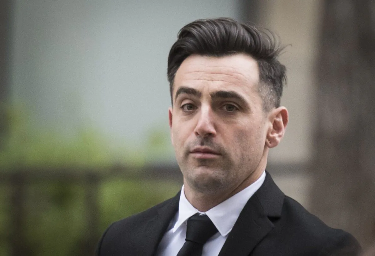 Canadian musician Jacob Hoggard arrives at the Toronto courthouse for sentencing after being found guilty earlier this year of sexually assaulting an Ottawa woman, on Oct. 20, 2022. (The Canadian Press/ Tijana Martin)