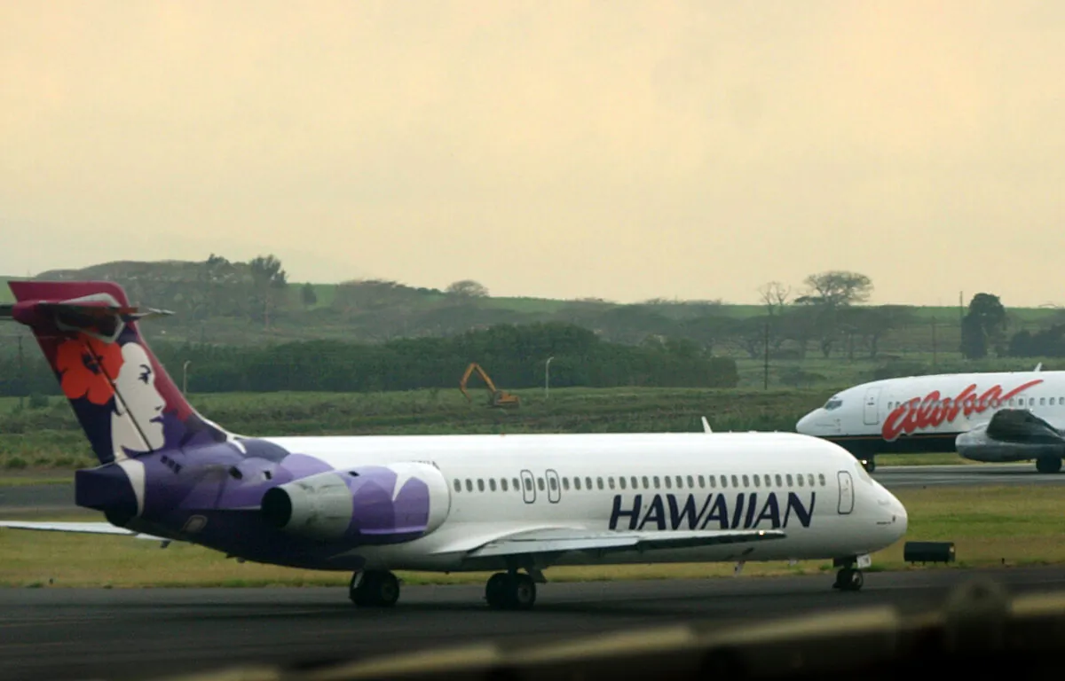 An Hawaiian Airlines plane taxis for position at Kahalui, Hawaii on the island of Maui, on March 24, 2005. (Lucy Pemoni/AP Photo, FIle)