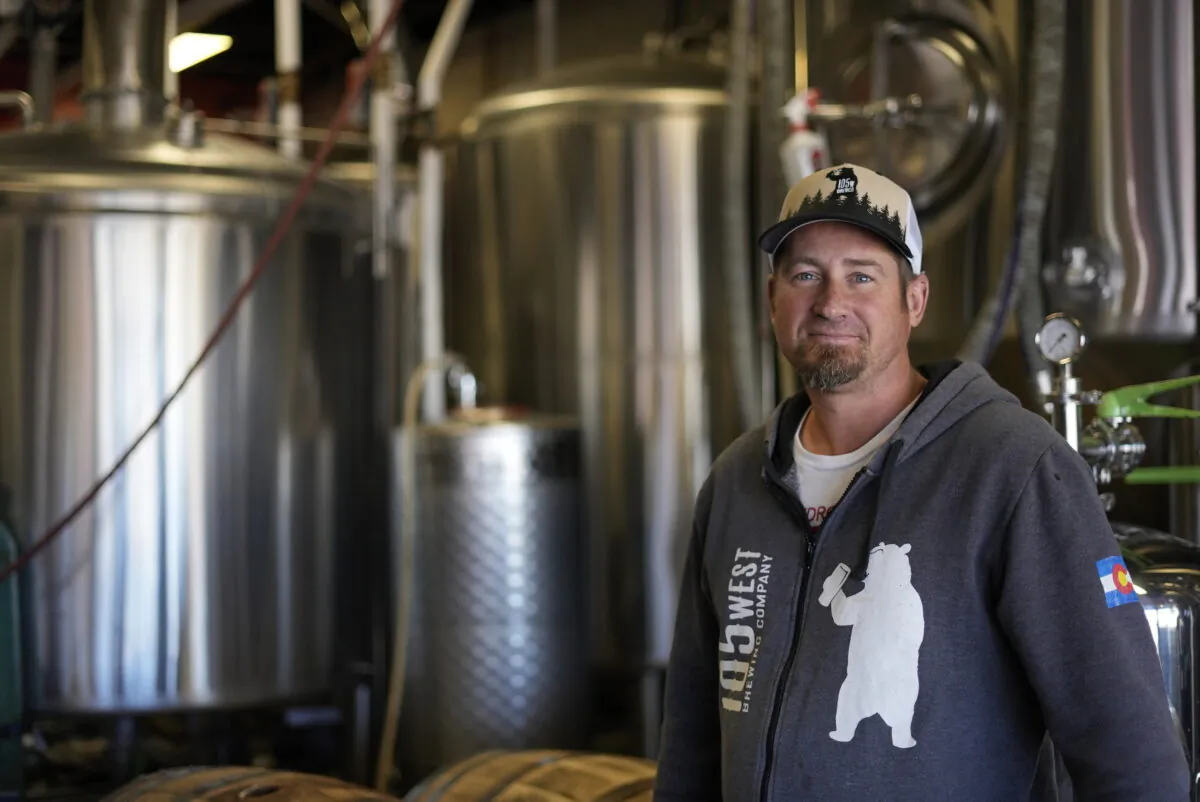 Eric Seufert, owner and manager of 105 West Brewing Co., poses for a photo at his brewery room, in Castle Rock, Colo., on Oct. 18, 2022. (Brittany Peterson/AP Photo)