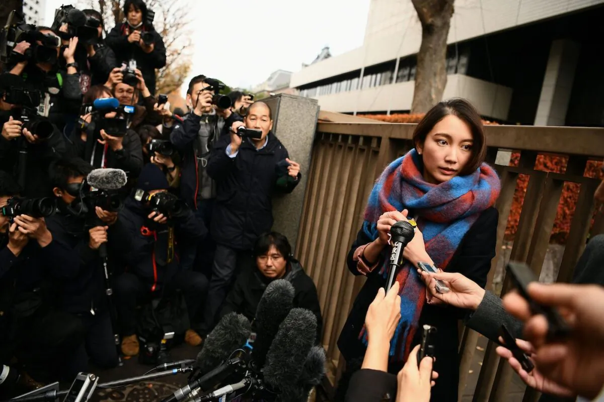 Japanese journalist Shiori Ito speaks outside a Tokyo court on Dec. 18, 2019, after hearing the ruling on a damages lawsuit by her, accusing a former TV reporter of rape. In this case, the court awarded her 3.3 million yen ($30,000). (Charly Triballeau/AFP via Getty Images)