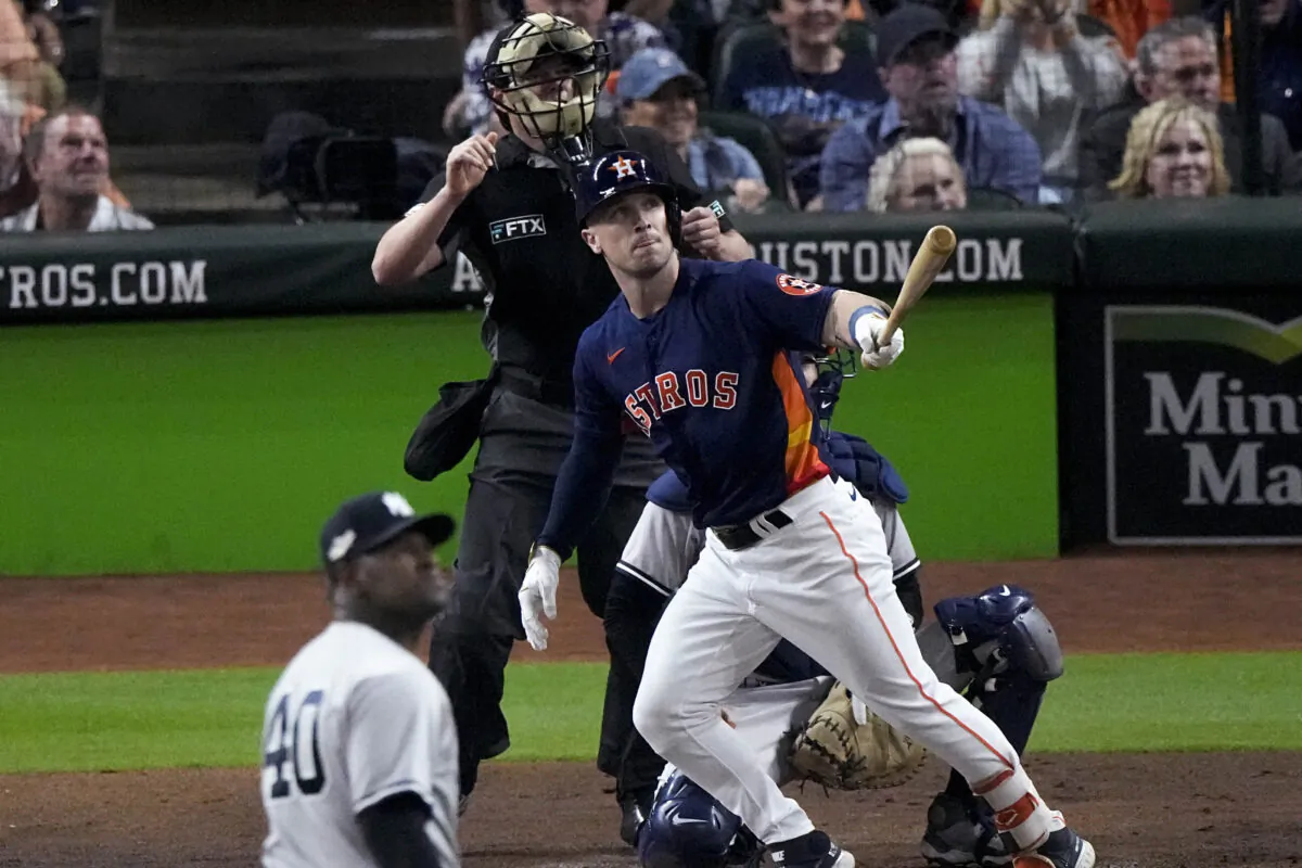 Houston Astros Alex Bregman (2) hits a solo homer during the third inning in Game 2 of baseball's American League Championship Series between the Houston Astros and the New York Yankees, in Houston, Oct. 20, 2022. (Sue Ogrocki/AP Photo)