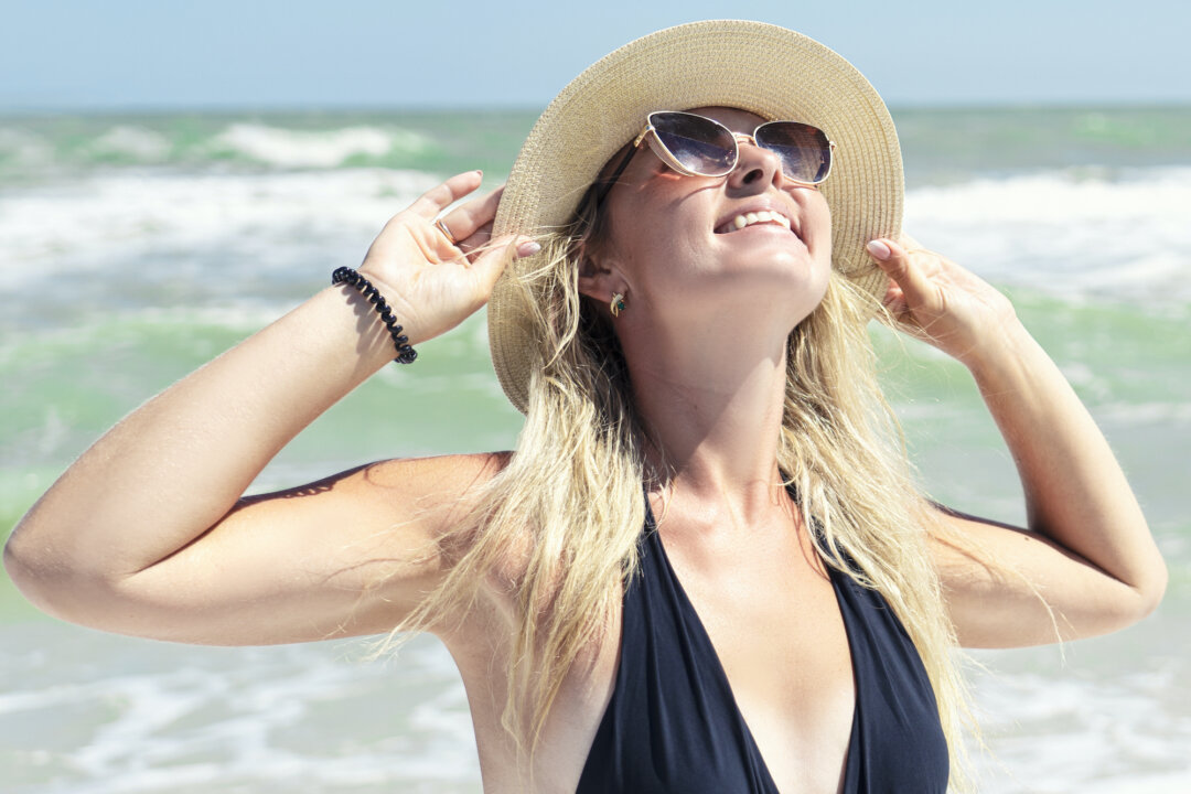 Receiving adequate sun exposure is vital for a healthy body and a happy mind. However, burning your skin can result in skin damage. (Koltsov/Shuttertock)