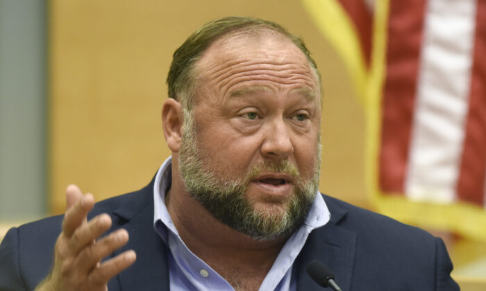 Alex Jones takes the witness stand to testify at a trial at Connecticut Superior Court in Waterbury, Conn., on Sept. 22, 2022. (Tyler Sizemore/Hearst Connecticut Media via AP, Pool, File)