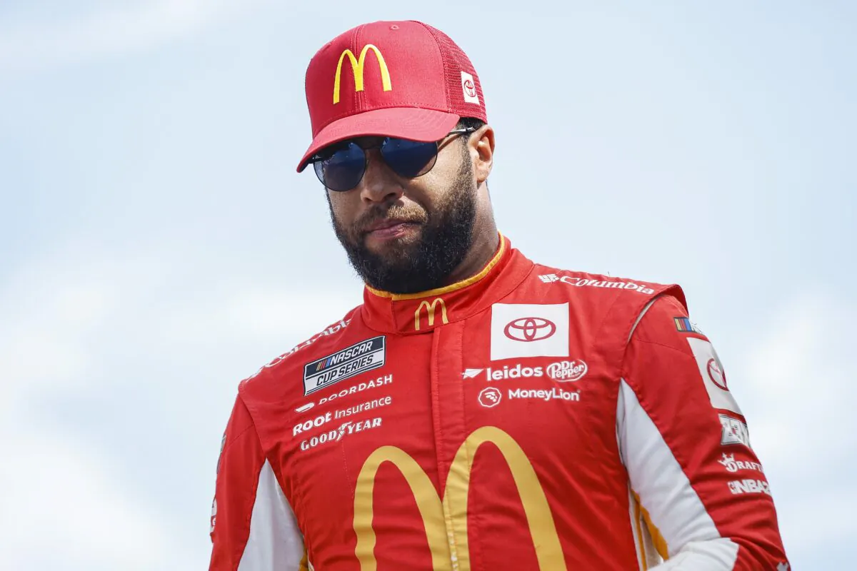 Bubba Wallace, driver of the #45 McDonald's Toyota, walks onstage during driver intros prior to the NASCAR Cup Series South Point 400 at Las Vegas Motor Speedway in Las Vegas on Oct. 16, 2022. (Sean Gardner/Getty Images)