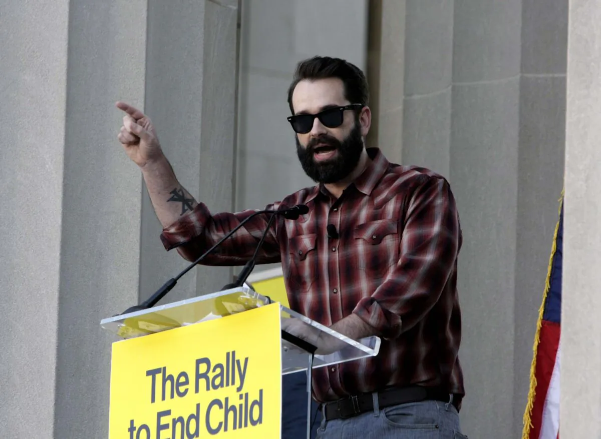Conservative podcast host Matt Walsh speaks at War Memorial Plaza during the “Rally to End Child Mutilation” Oct. 21, 2022, in Nashville, Tenn. (Bobby Sanchez for The Epoch Times)
