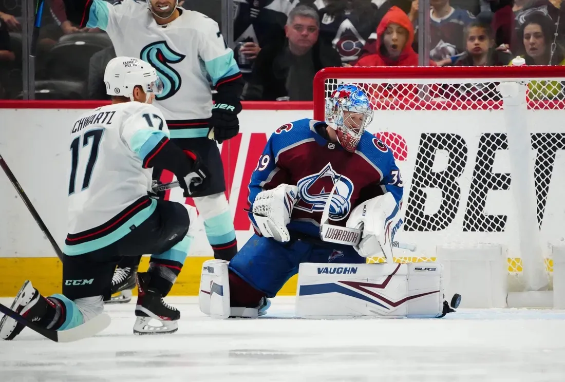 Seattle Kraken winger Jaden Schwartz takes shot at goal as Colorado Avalanche goalie Pavel Francouz attempts save, in Denver, on Oct. 21, 2022. (Field Level Media)