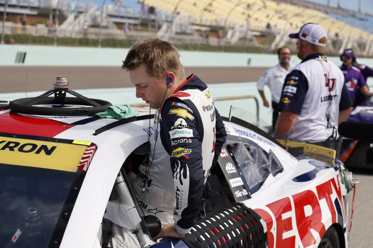 William Byron gets into his car during NASCAR Cup qualifying at Homestead-Miami Speedway in Homestead, Fla., on Oct. 22, 2022. (Terry Renna/AP Photo)