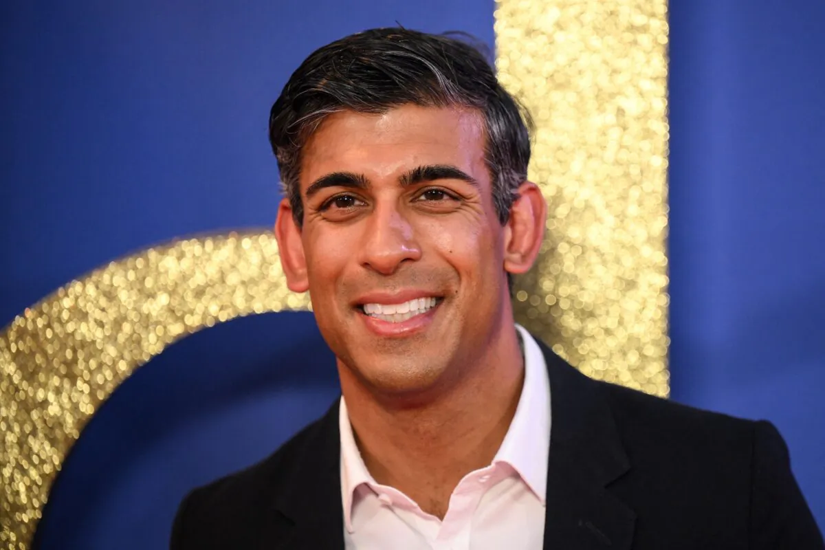 Rishi Sunak poses on the red carpet on arrival to attend the World premiere of the Roald Dahl's Matilda The Musical, during the 2022 BFI London Film Festival, in London, on Oct. 5, 2022. (Daniel Leal /AFP via Getty Images)