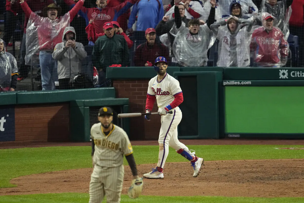 Philadelphia Phillies' Bryce Harper watches his two-run home run during the eighth inning in Game 5 of the baseball NL Championship Series between the San Diego Padres and the Philadelphia Phillies in Philadelphia, on Oct. 23, 2022. (Matt Rourke/AP Photo)