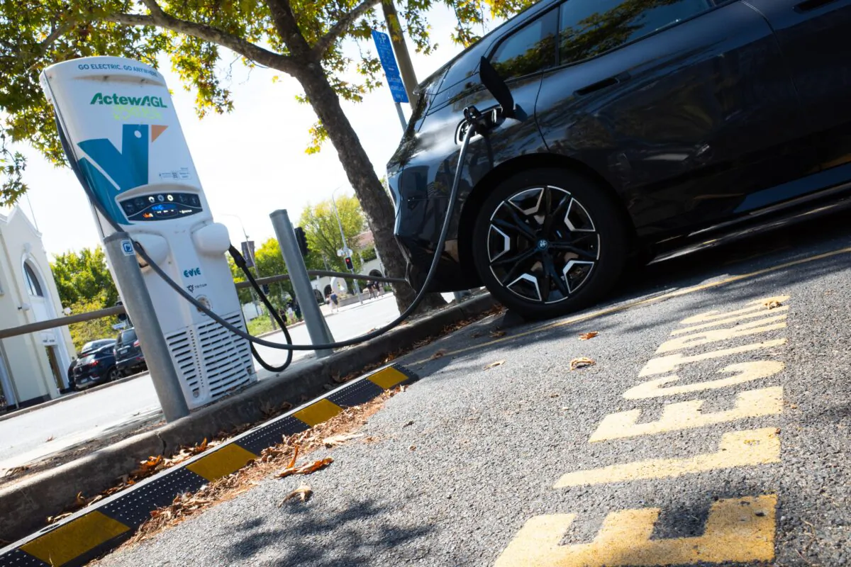 An electric car is seen recharging at an ActewAGL charging station in Canberra, Australia, on March 21, 2022. (AAP Image/Lukas Coch)