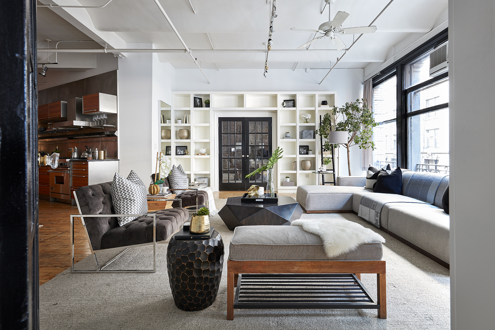 A bench helps to both frame this living space and provide additional seating.