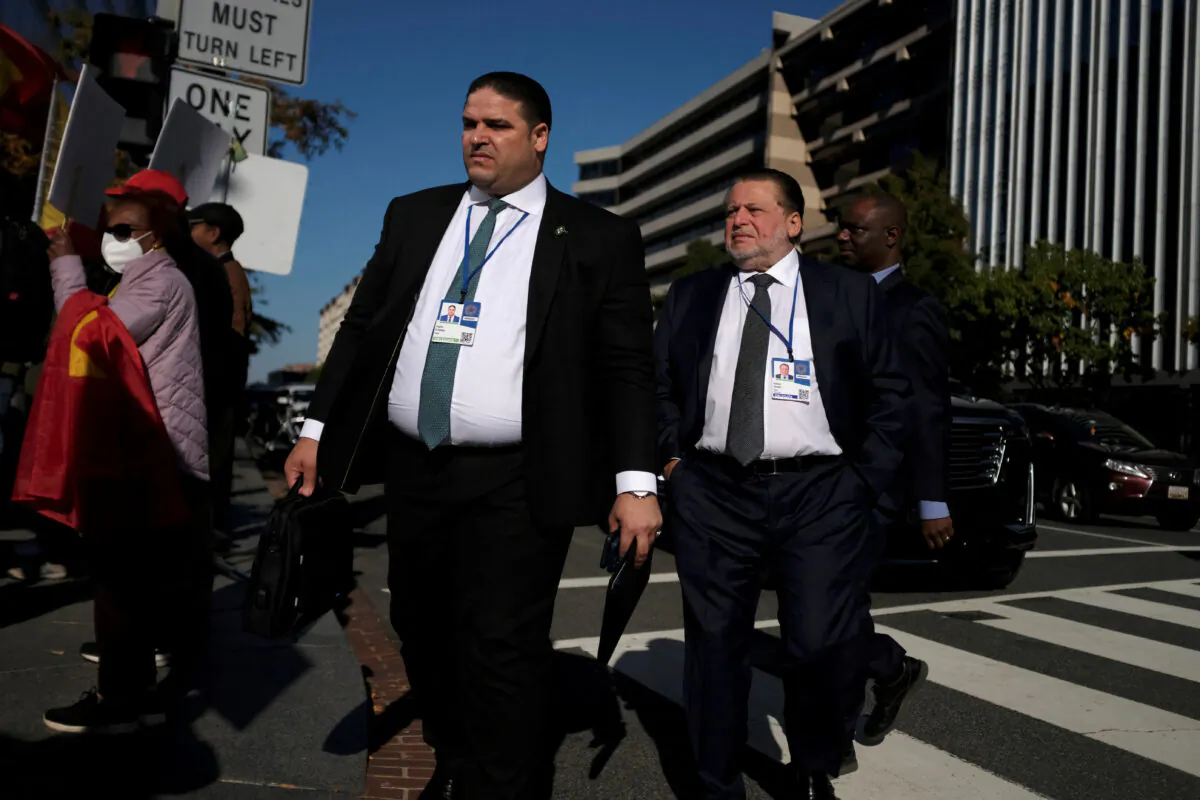 Governor of the Central Bank of Egypt Hassan Abdalla arrives at IMF headquarters during the Annual Meetings of the International Monetary Fund and World Bank in Washington on Oct. 15, 2022. (James Lawler Duggan/Reuters)