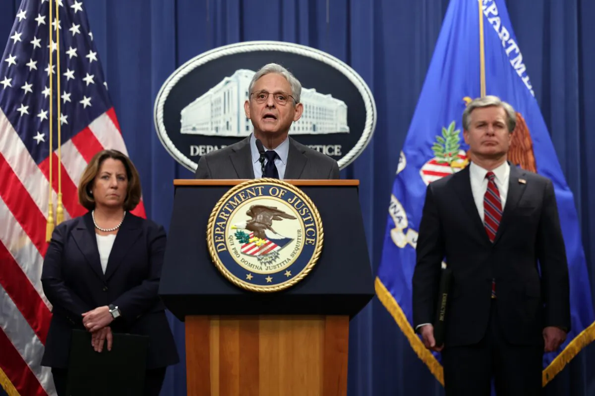 U.S. Attorney General Merrick Garland (C), FBI Director Christopher Wray (R) and Deputy Attorney General Lisa Monaco hold a press conference at the U.S. Department of Justice in Washington on Oct. 24, 2022. (Kevin Dietsch/Getty Images)
