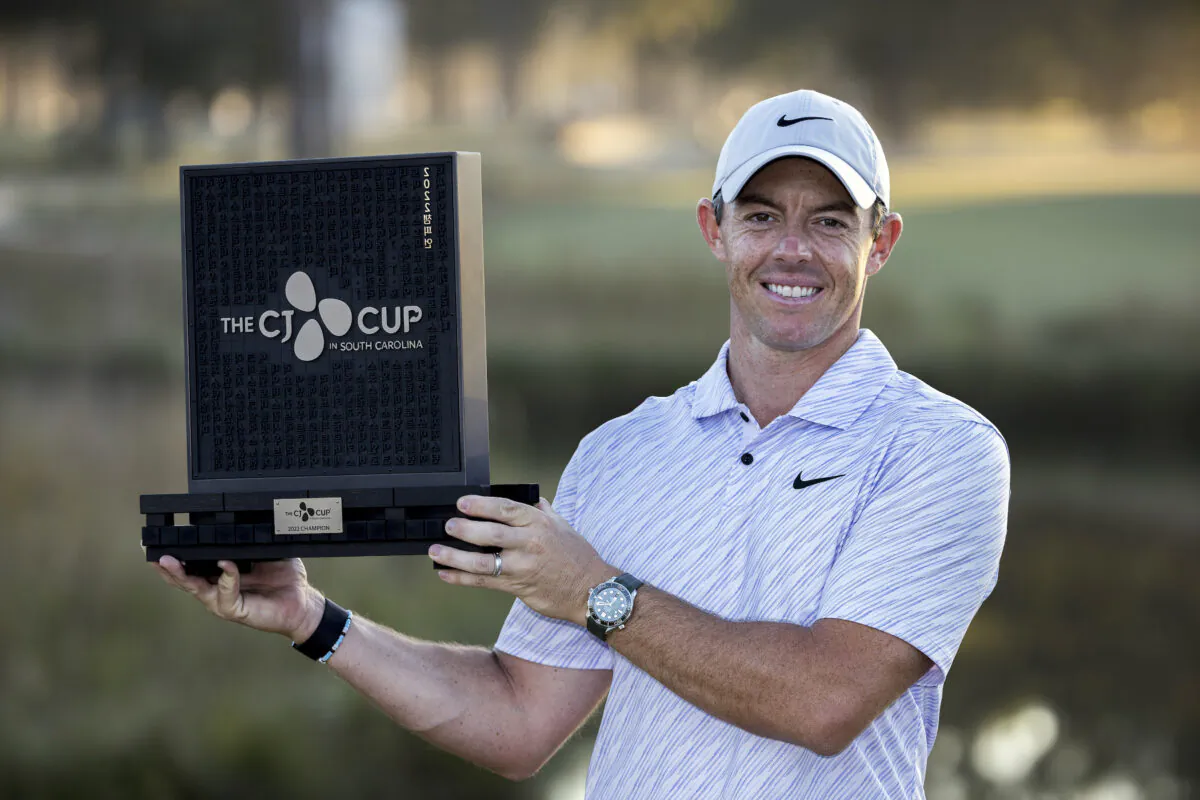Rory McIlroy, of Northern Ireland, holds the winning trophy after the final round of the CJ Cup golf tournament in Ridgeland, S.C., on Oct. 23, 2022. (Stephen B. Morton/AP Photo)
