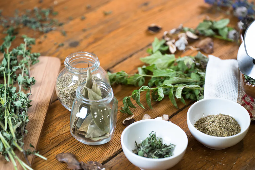 Growing your own herbs is easy, therapeutic, and provides useful home remedies that can make you feel better physically and mentally. (Aerial Mike/Shutterstock)