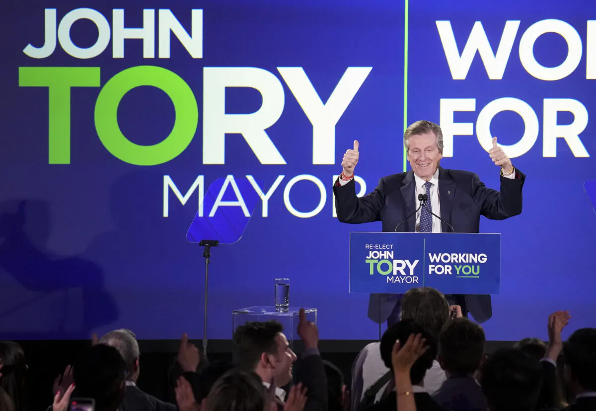 John Tory reacts on stage after winning and being elected for a third term as the mayor of Toronto, on Oct. 24, 2022.  (The Canadian Press/Nathan Denette)