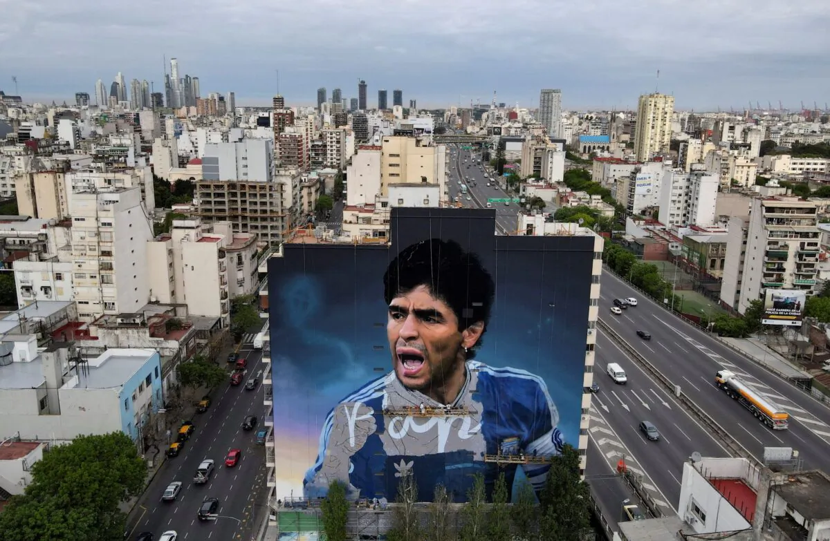 A mural depicting late soccer legend Diego Armando Maradona, which will be presented on the anniversary of Maradona, the 30th of October, in Buenos Aires, Argentina on Oct. 19, 2022. (Tomas Cuesta/Reuters)