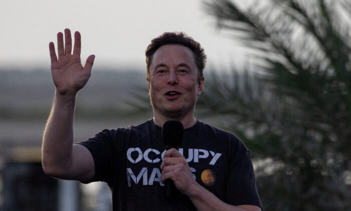Elon Musk, chief executive of Tesla and of SpaceX, gestures during a joint news conference with T-Mobile CEO Mike Sievert at the SpaceX Starbase in Brownsville, Texas, on Aug. 25, 2022. (Adrees Latif/Reuters)