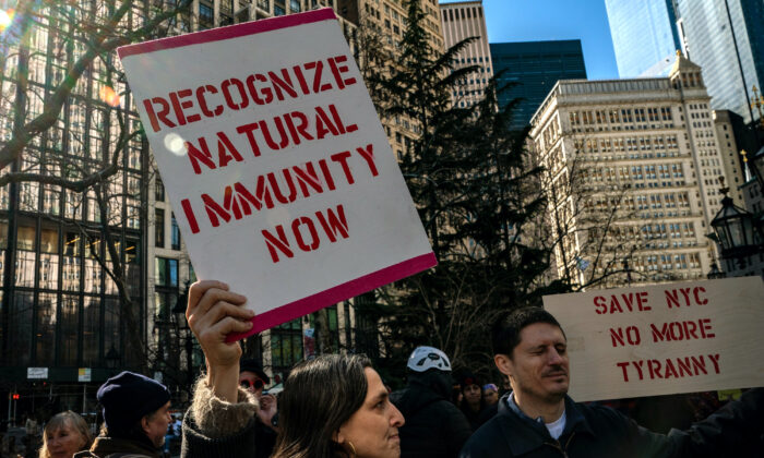 People gather at City Hall to protest New York City’s vaccine mandate in New York City, on Feb. 11, 2022. (David Dee Delgado/Getty Images)