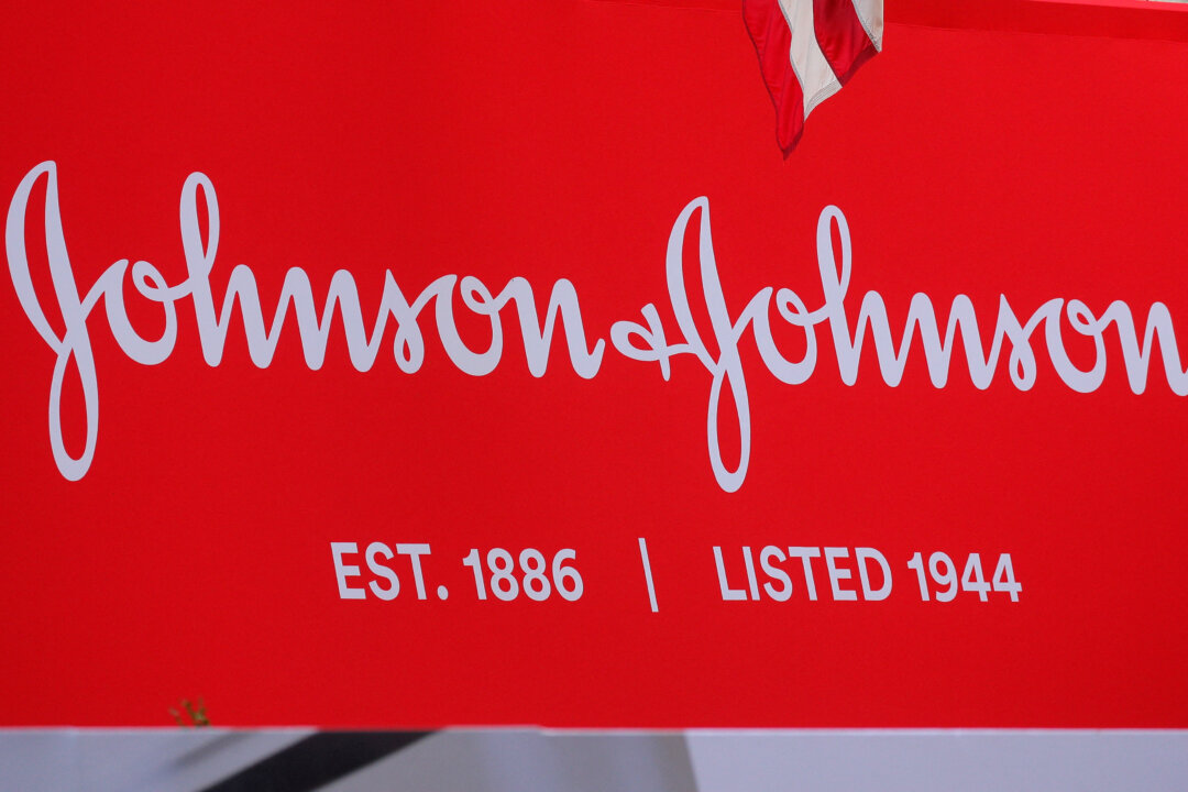 The company logo for Johnson & Johnson is displayed to celebrate the 75th anniversary of the company's listing at the New York Stock Exchange (NYSE) in New York on Sept. 17, 2019. (Brendan McDermid/Reuters)