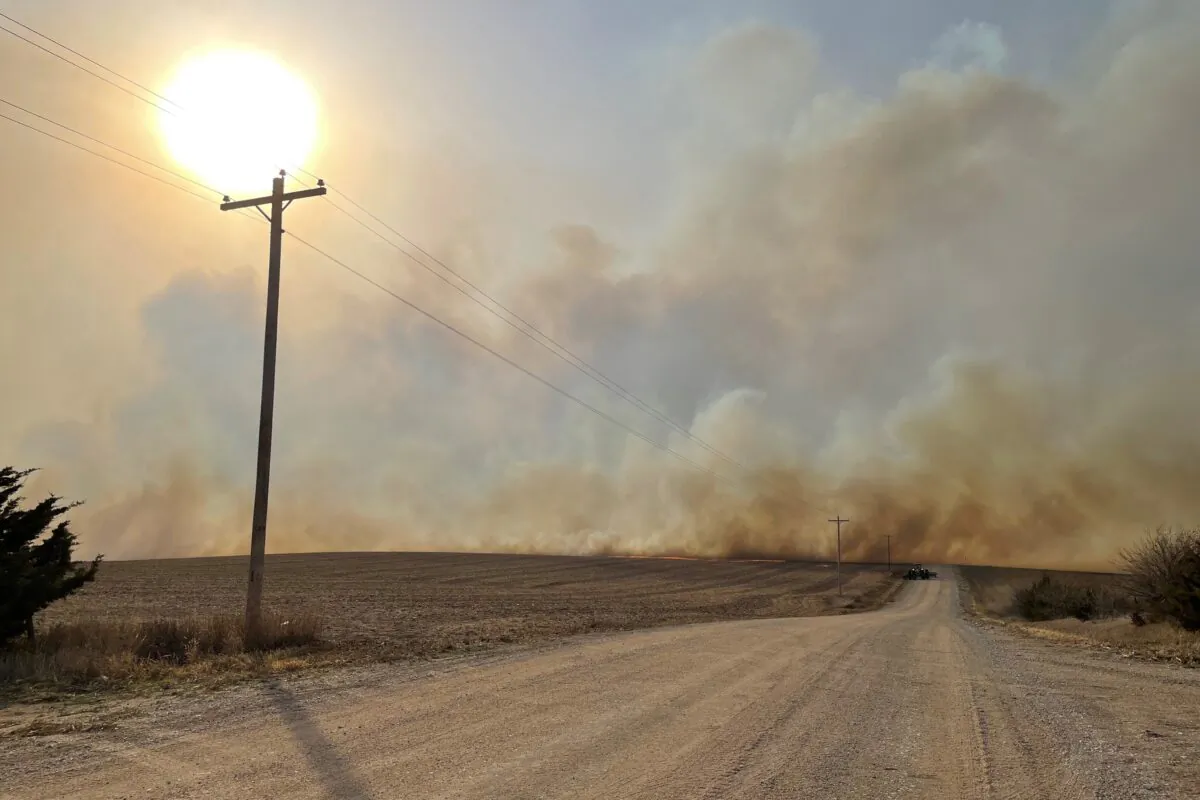 Smoke rises from a grass fire just east of Olive Creek State Recreation Area in southwestern Lancaster County, near Hallam, Neb., on Oct. 23, 2022. (Alex Lantz/Lincoln Journal Star via AP)