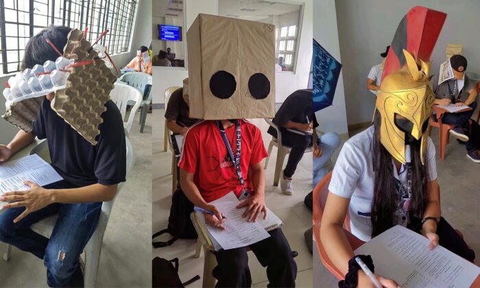菲律宾比科尔大学工程学院的学生在 2022 年 10 月 18 日的考试中戴上“反作弊帽”。（由 Mary Joy Mandane-Ortiz 提供）