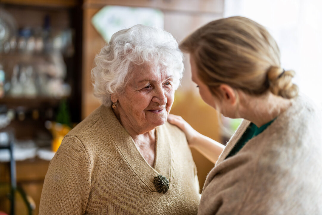 Kindness and compassion from family and medical professionals may help to reduce COVID-19-induced brain damage. pikselstock/Shutterstock