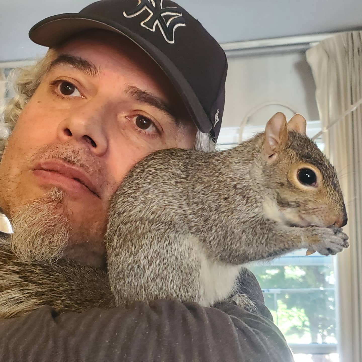 Baby Squirrel Forms Precious Bond With Disabled Veteran After Being Rejected by Her Mother