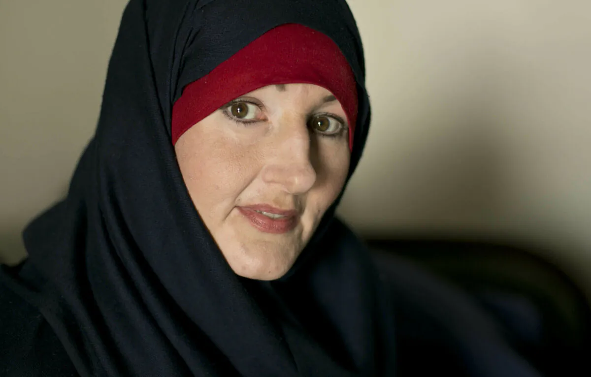 Kimberly Gwen Polman, a Canadian national, poses for a portrait at camp Roj in Syria on April 3, 2019. (Maya Alleruzzo/AP Photo)