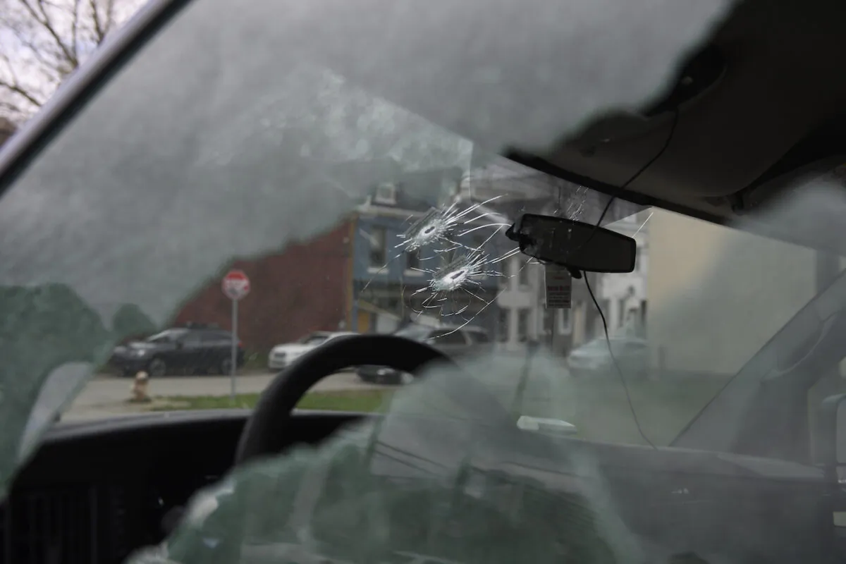 Bullet holes are seen in a van parked outside an Airbnb apartment rental in Pittsburgh on April 17, 2022. (Jeff Swensen/Getty Images)