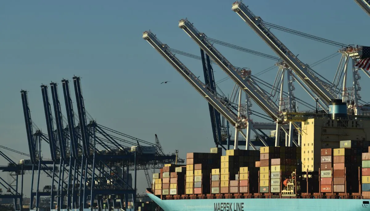 Cranes stack cargo containers at the Port of Baltimore in Baltimore, Md., on Nov. 10, 2021. (Brendan Smialowski/AFP via Getty Images)