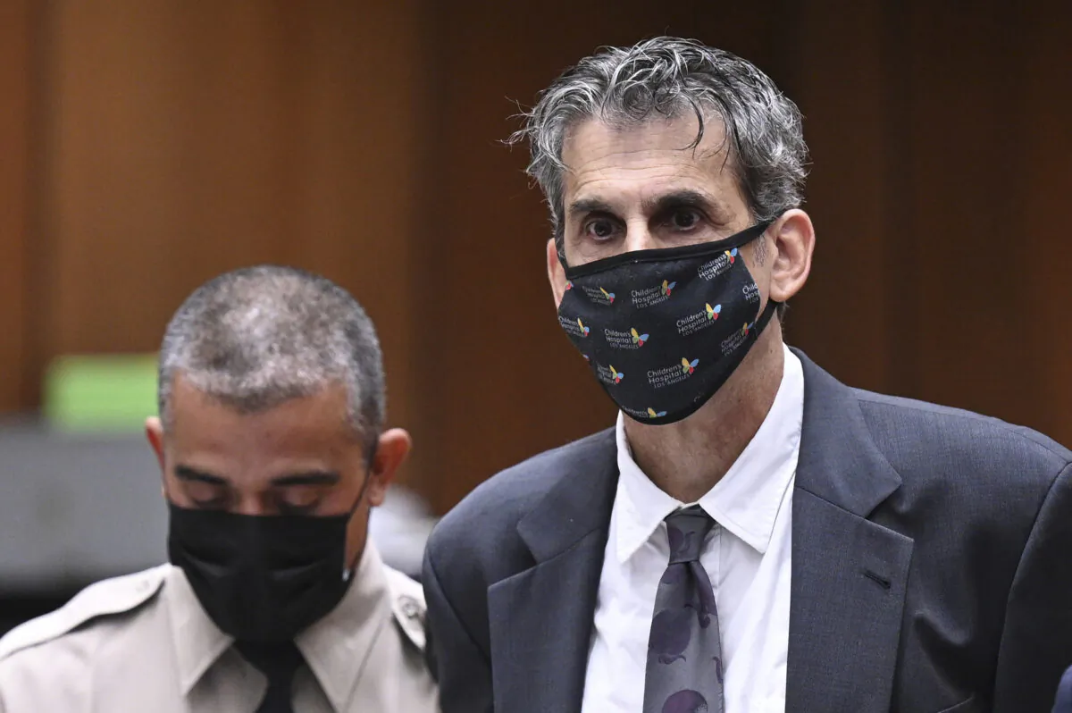Hollywood television producer Eric Weinberg, right, looks up after bail was denied at his arraignment, in Superior Court in Los Angeles on Oct. 25, 2022. (Robyn Beck/Pool Photo via AP)