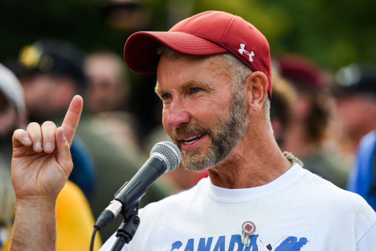 Army reservist James Topp speaks to the crowd during a protest against COVID-19 health measures at the National War Memorial in Ottawa, Ont. on June 30, 2022. (The Canadian Press/Spencer Colby)