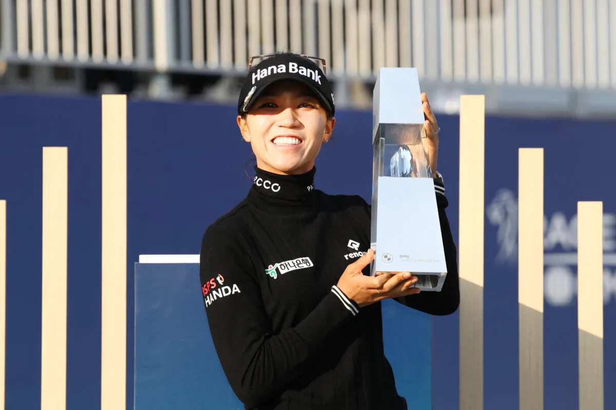 Lydia Ko of New Zealand poses with the trophy after winning the tournament following the final round of the BMW Ladies Championship at Oak Valley Country Club in Wonju, South Korea, on Oct. 23, 2022. (Chung Sung-Jun/Getty Images)