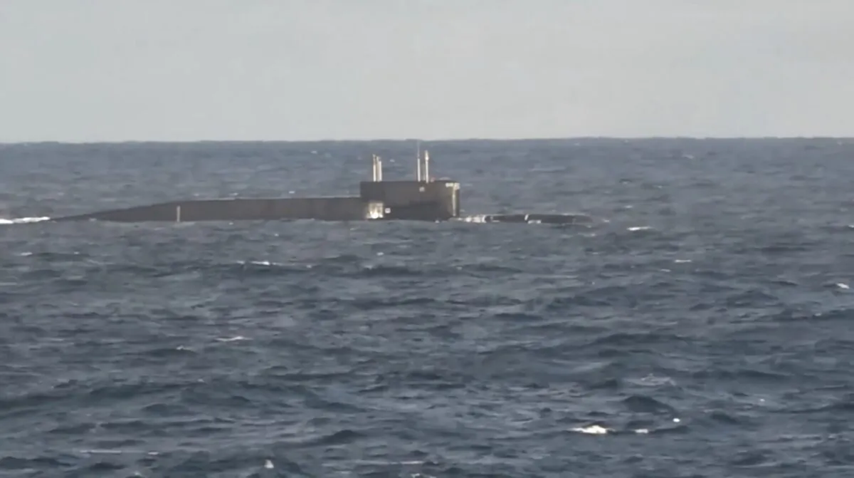 What is said to be Russia's strategic nuclear-powered ballistic missile submarine Tula during exercises held by strategic nuclear forces at an unknown location, in this image taken from handout footage released on Oct. 26, 2022. (Russian Defense Ministry/Handout via Reuters)