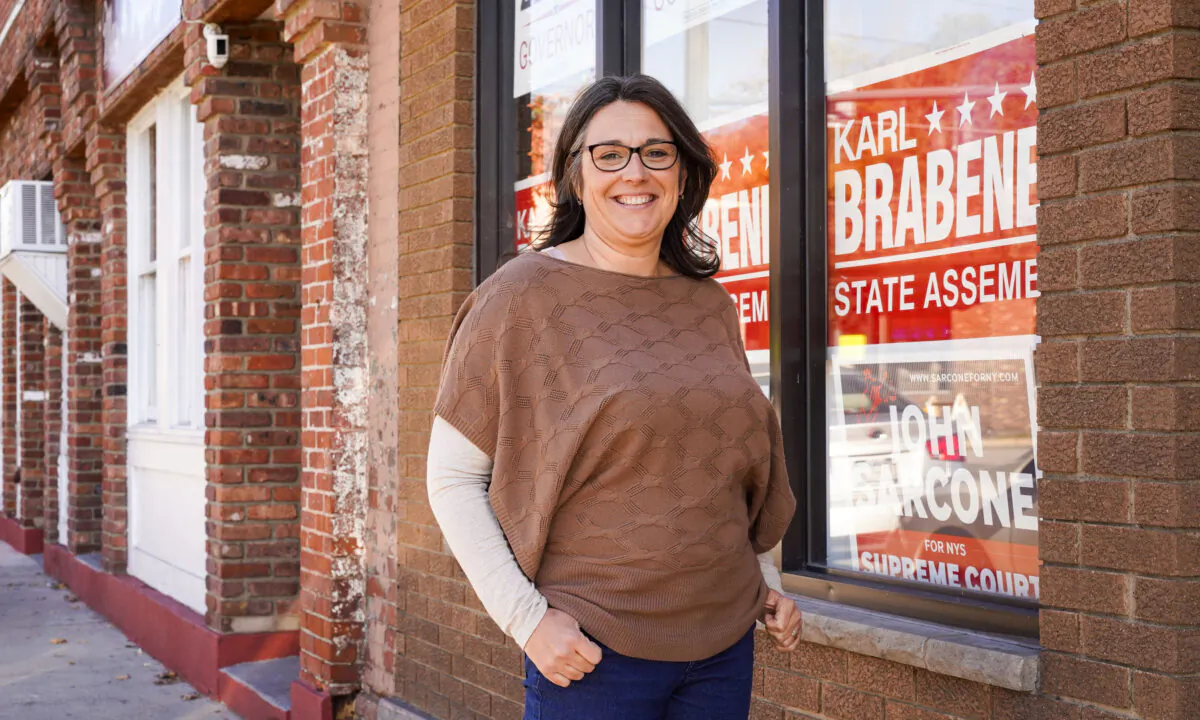 Dorey Houle, the Republican candidate for New York 42nd State Senate District, stands outside a Republican campaign office in Port Jervis, N.Y. on Oct. 21, 2022. (Cara Ding/The Epoch Times)
