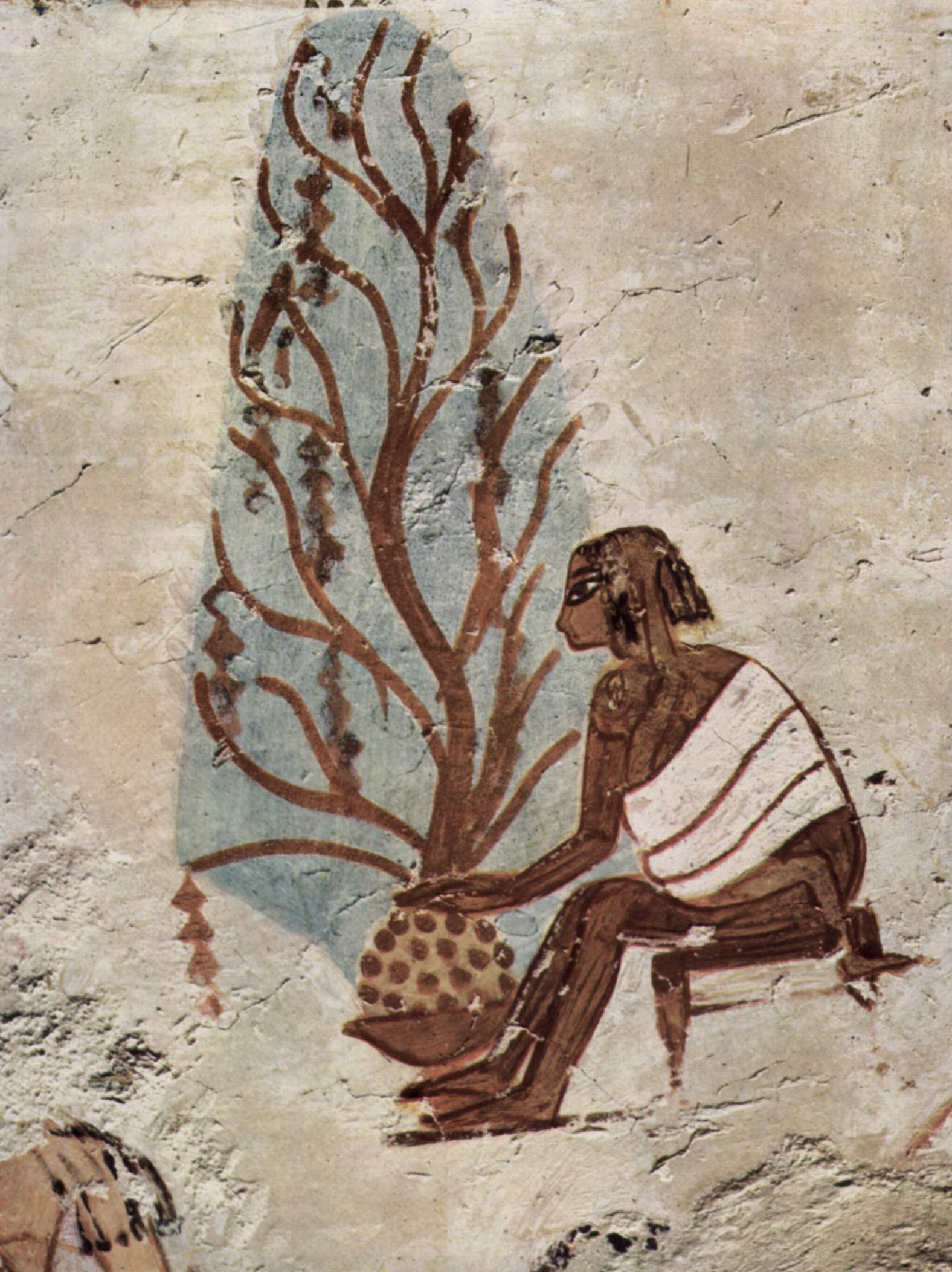 An Egyptian wall painting in a tomb of a mother and child