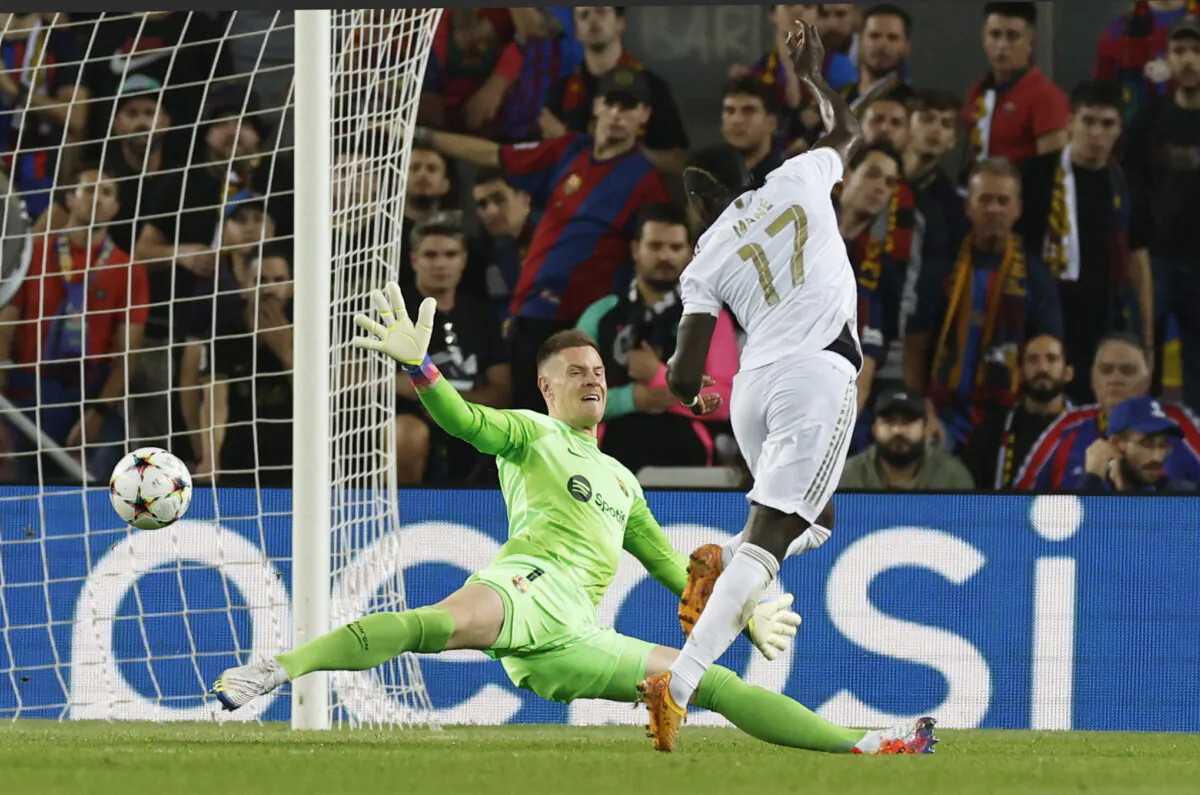 Bayern Munich's Sadio Mane scores their first goal during the Champions League, Group C football match between FC Barcelona and Bayern Munich at the Camp Nou stadium in Barcelona, Spain, on Oct. 26, 2022. (Albert Gea/Reuters)
