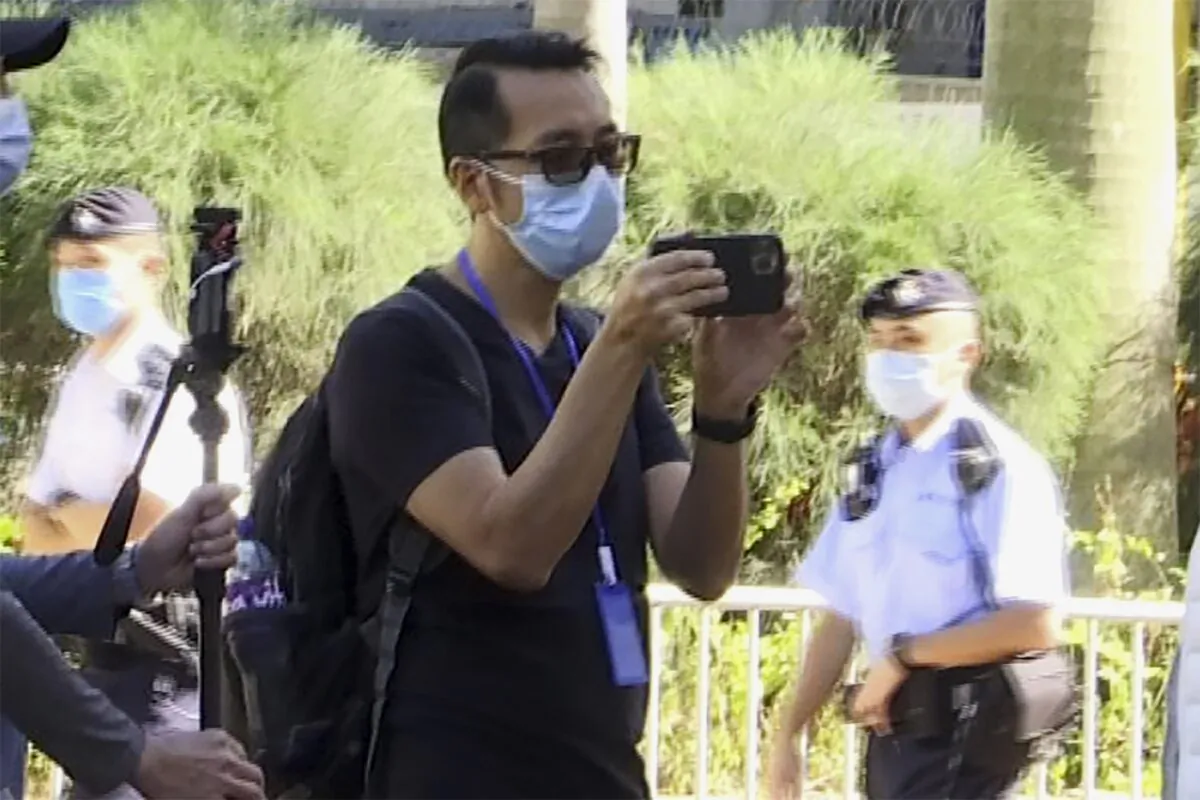Garry Pang Moon-yuen outside the West Kowloon Court in Hong Kong on Nov. 29, 2021, in this photo taken from video. (Alice Fung/AP Photo)