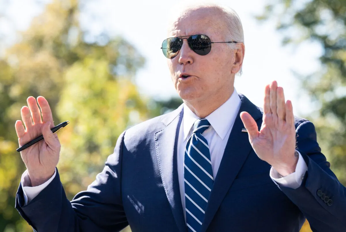 President Joe Biden speaks to the press as he walks to Marine One prior to departure from the South Lawn of the White House in Washington, on Oct. 27, 2022. (Saul Loeb/AFP via Getty Images)