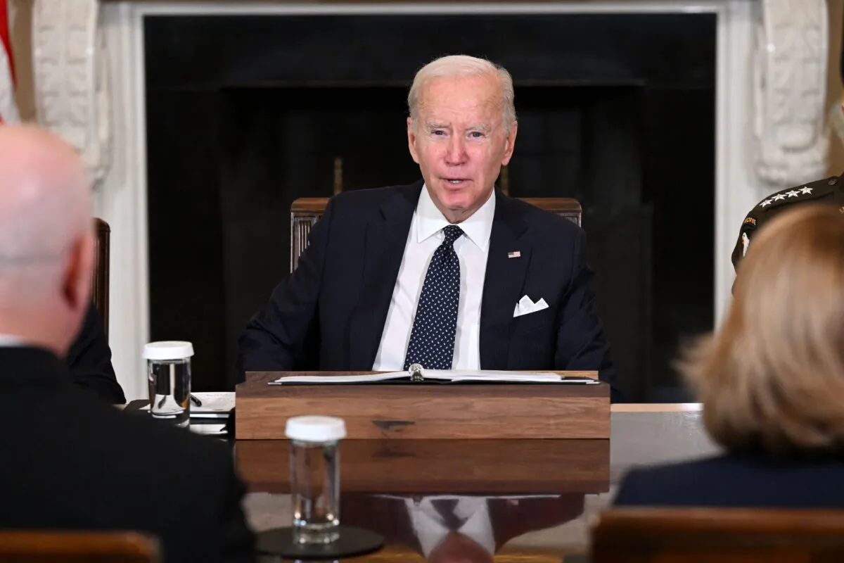 President Joe Biden meets with Defense Secretary Lloyd Austin, Chairman of the Joint Chiefs of Staff General Mark Milley, and Department of Defense leaders, not pictured, to discuss national security priorities, in the State Dining Room of the White House on Oct. 26, 2022. (Saul Loeb/AFP via Getty Images)