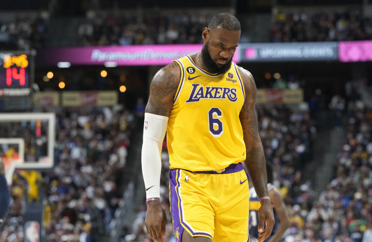 Los Angeles Lakers forward LeBron James heads to the bench in the second half of an NBA basketball game against the Denver Nuggets in Denver on Oct. 26, 2022. (David Zalubowski/AP Photo)