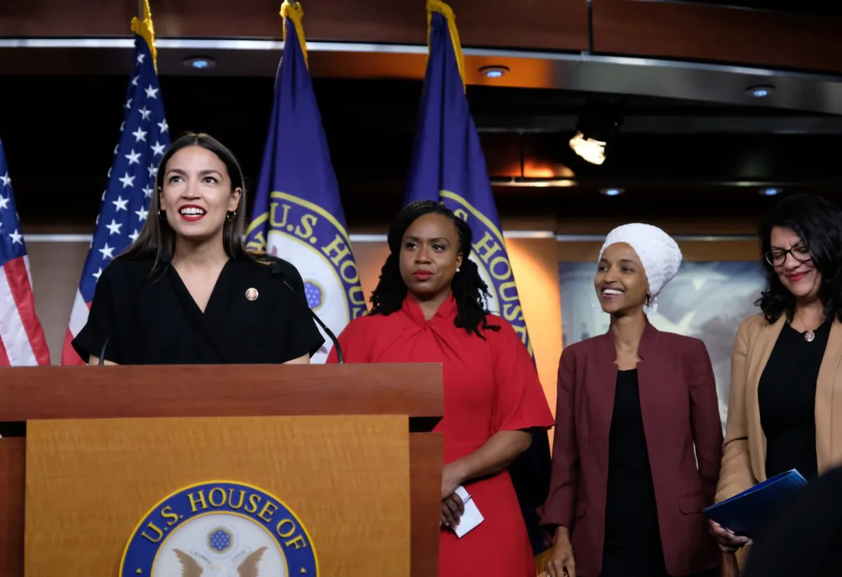U.S. Rep. Alexandria Ocasio-Cortez (D-N.Y.) speaks as Reps. Ayanna Pressley (D-Mass.), Ilhan Omar (D-Minn.), and Rashida Tlaib (D-Mich.) listen during a press conference at the U.S. Capitol in Washington on July 15, 2019. (Alex Wroblewski/Getty Images)
