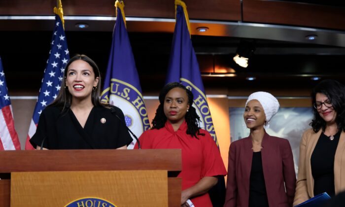 U.S. Rep. Alexandria Ocasio-Cortez (D-N.Y.) speaks as Reps. Ayanna Pressley (D-Mass.), Ilhan Omar (D-Minn.), and Rashida Tlaib (D-Mich.) listen during a press conference at the U.S. Capitol in Washington on July 15, 2019. (Alex Wroblewski/Getty Images)