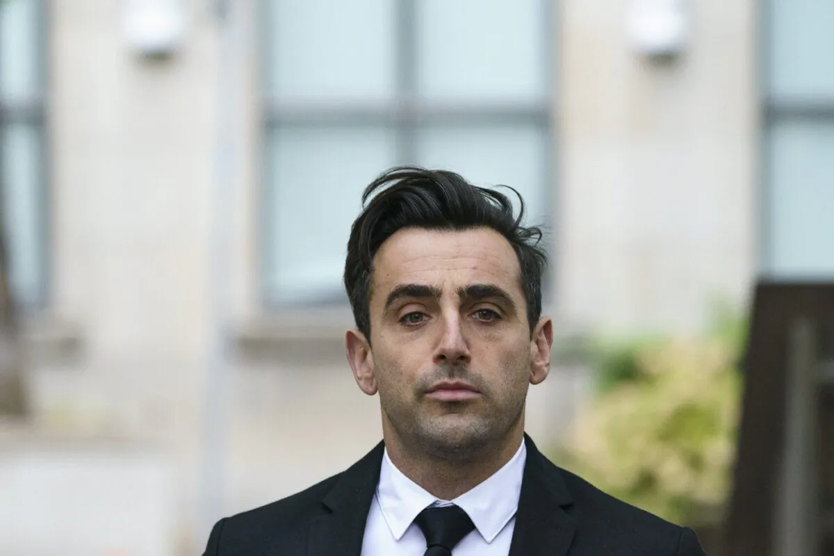 Canadian musician Jacob Hoggard arrives at court in Toronto on Oct. 6, 2022. (The Canadian Press/Alex Lupul)