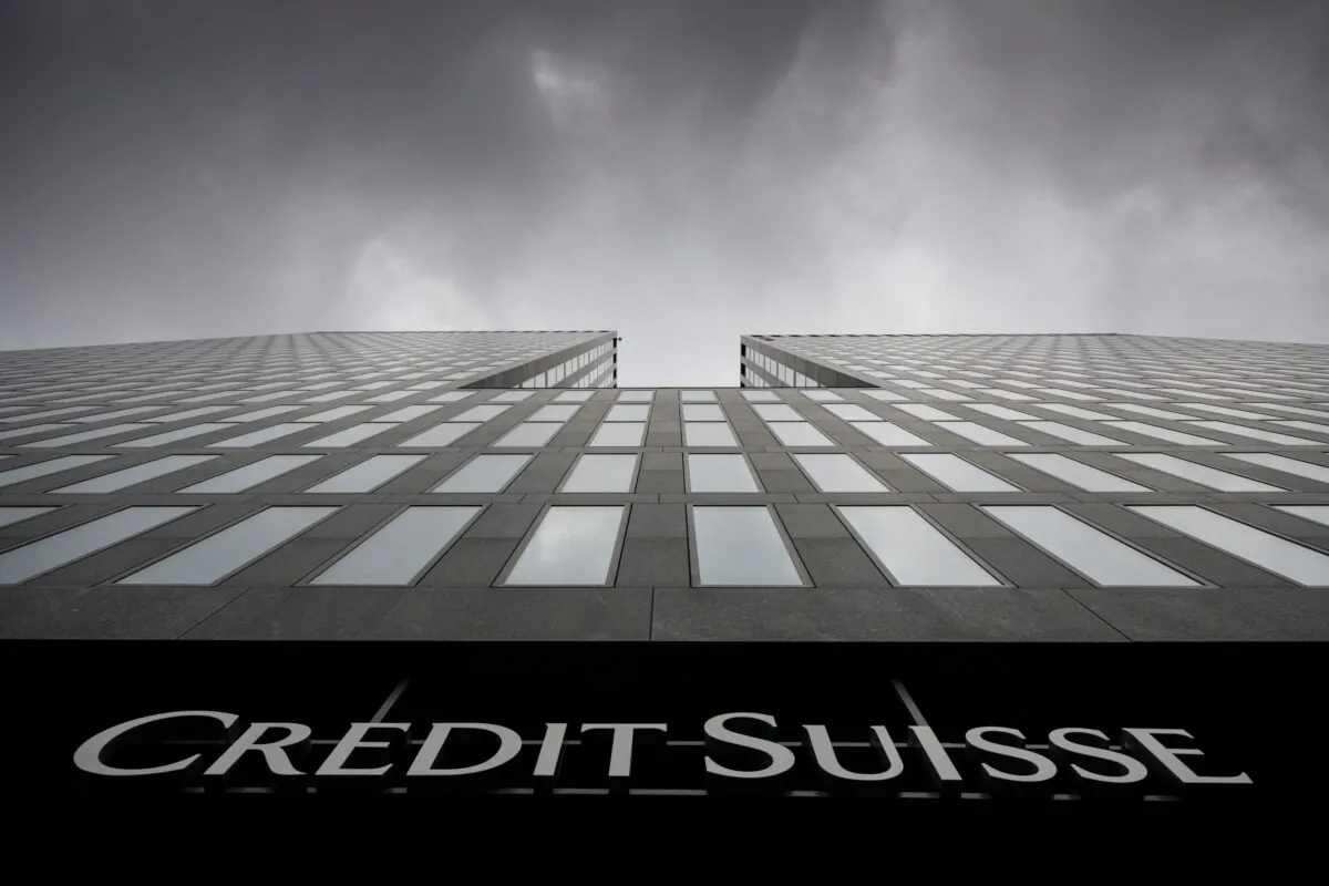 Grey clouds cover the sky over a building of the Credit Suisse bank in Zurich on Feb. 21, 2022. (Ennio Leanza/Keystone via AP)