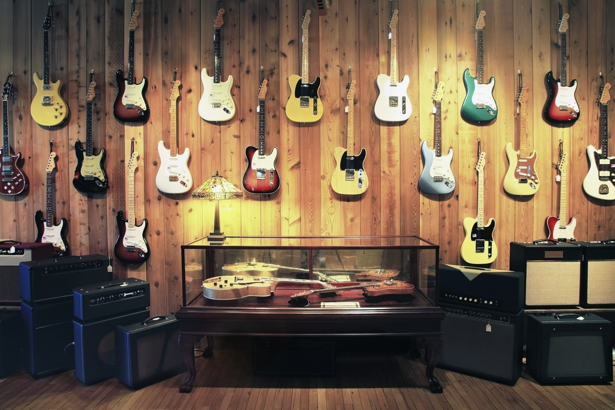 Electric guitars and amplifiers in music store